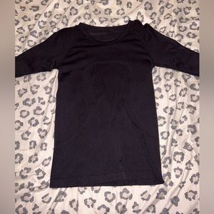 SOLD. LULULEMON black swiftly tech long sleeve. size 4.